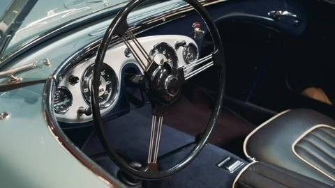 View of instrumental panel and wheel of retro car Stock Footage 113919789