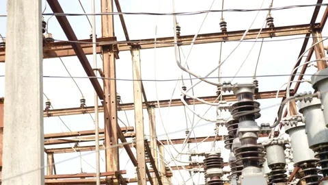View of insulators attached over electric pillars Stock Footage 147858365