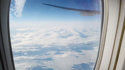 View from intercontinental airplane porthole Stock Footage 107908119