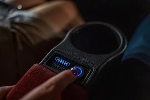 A view of the interior of a 4D cinema, showcasing rows of plush seats and a.. Foto stock