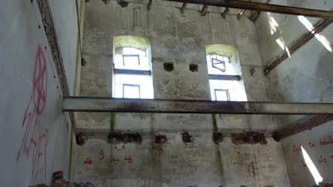 A view of the interior of an abandoned grain mill. The shot was taken in soft Stock Footage 156168352