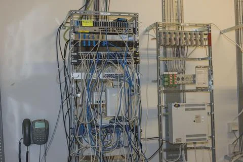 View of interior view technical  computer room with all cable connections. Stock Photos