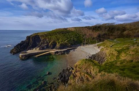 View of the Irish cliffs. beach in tramore ireland, Newtown Cove Stock Photos