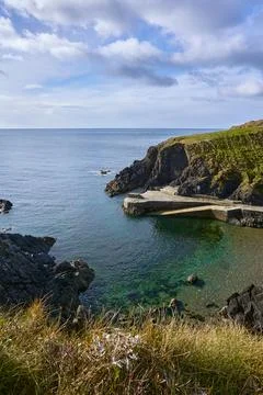 View of the Irish cliffs. beach in tramore ireland, Newtown Cove Stock Photos