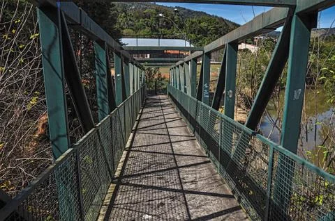 View of iron bridge over small river at Monte Alegre do Sul. Stock Photos