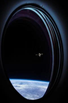 View on ISS Progress resupply ship, View out from a passenger window on the Stockfoto's