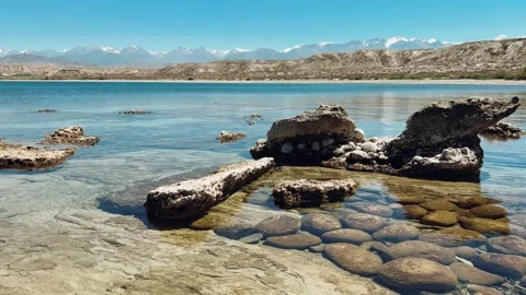 View of Issyk-Kul mountain lake, Kyrgyzstan.  Stock Footage 253873778