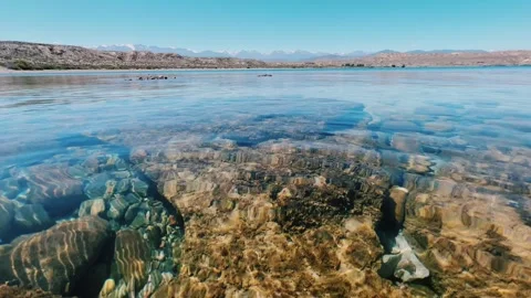 View of Issyk-Kul mountain lake, Kyrgyzstan. Stock Footage 256199696