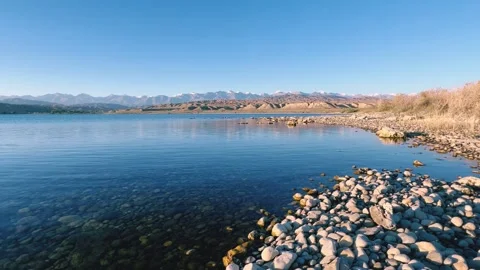 View of Issyk-Kul mountain lake, Kyrgyzstan.  Stock Footage 272735622