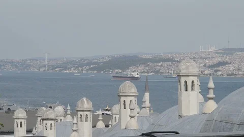 View of Istanbul over domed rooftops towards Galata bridge and Bosphorus Stock Footage 90705956