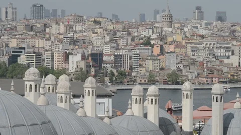 View of Istanbul over domed rooftops towards Galata tower, Beyoğlu and Karaköy Stock Footage 90707179