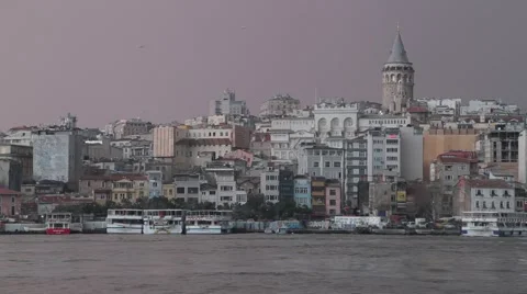 View of Istanbul's Galata Tower from Eminonu at dusk Stock Footage 59579828