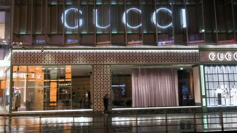 Street view luxury Gucci and Prada store, Stock Video