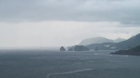 View of Izu peninsula coastline with dramatic weather, Shizuoka Prefecture Stock Footage 318564146