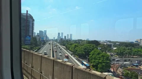 View of Jakarta city from the MRT train window Stock Footage 334551920