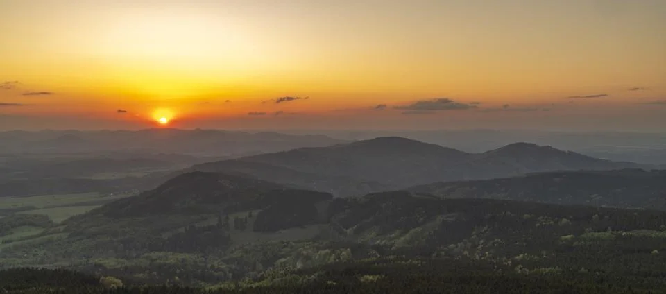 View from Jested hill on spring fresh landscape with color sunset Stock Photos
