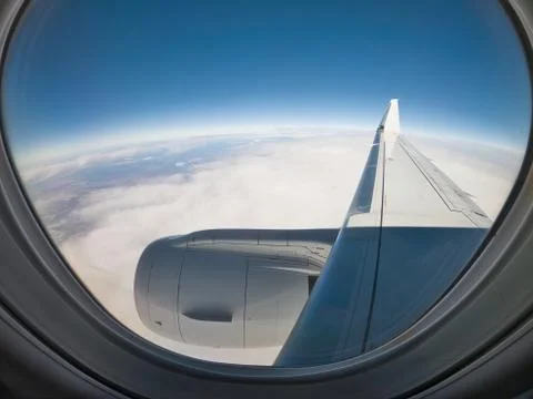View from a Jet Airplane in flight, framed by the Window Stock Photos