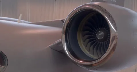 View of jet engine nacelle showing fan blades and technician testing mood Видео 333890530