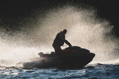 View of jet ski in motion, group of jet skiers with a big water splash Stock Photos