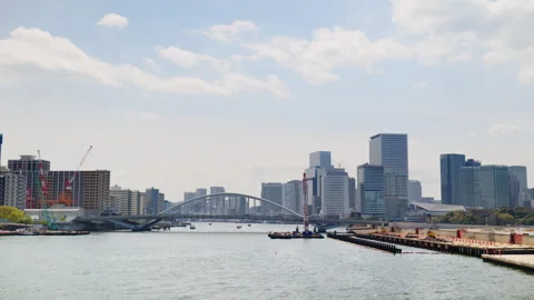 View of the Kachidoki Bridge with the buildings in Chuo, Japan on the background Stock Footage 309548068