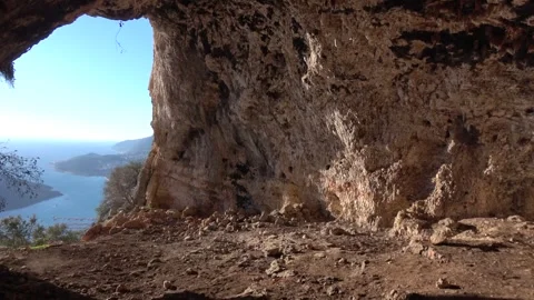 View of Kas coastline through ancient cave opening Video stock 343161170