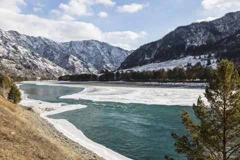 View on the Katun river flows among the Altai Mountains in winter Stock Photos