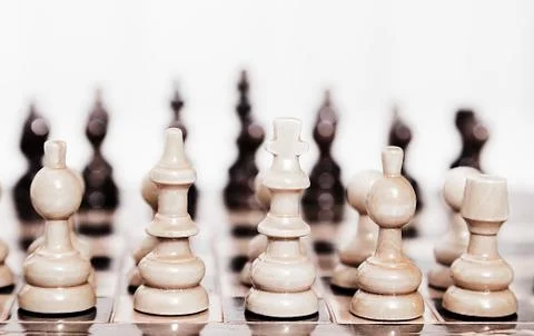 View from king of first move pawn on chess board close up Stock Photos