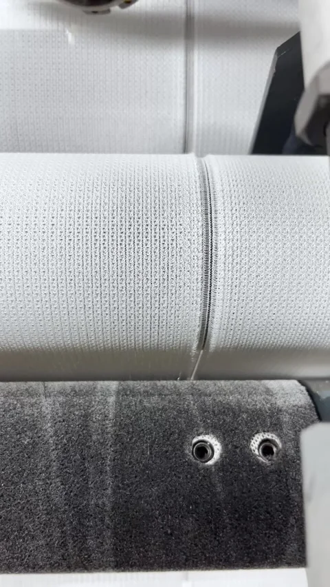 A view of knitting defects on the fabric of a thread break Stock Footage 274148474