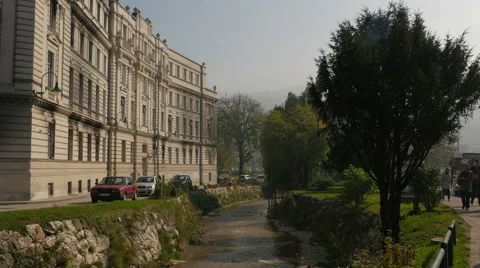 View of Kosevski potok flowing in front of Opcina Centar Sarajevo in Sarajevo Stock Footage 59827358