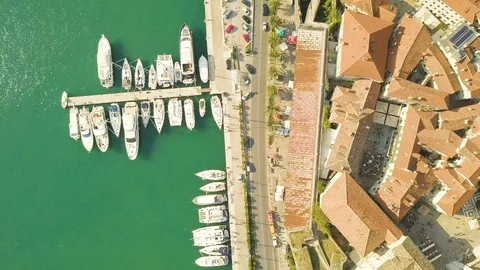 View of Kotor old town with  yachts at the marina. Montenegro Vidéo 96004100