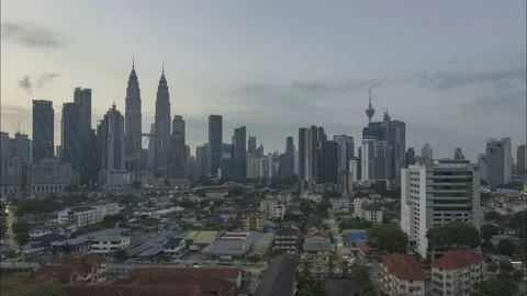 View of kuala lumpur skyline during sunrise in 4k Stock Footage 155536136