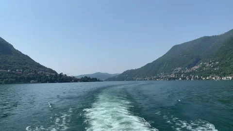 View of Lago di Como lake from a moving moat. Motion of waves. Lake Como, Italy. Stock Footage 166585959
