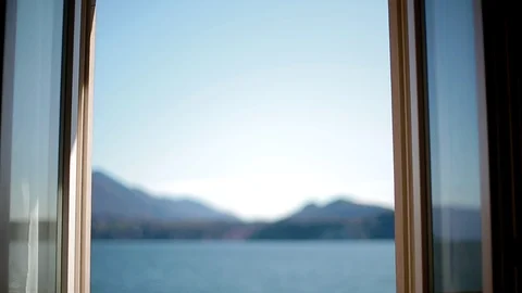 View of Lago Maggiore through closing window. Stock Footage 87823592