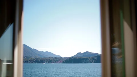 View of Lago Maggiore through open window Stock Footage 87823613