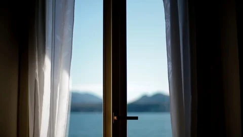 View of Lago Maggiore through opening window Stock Footage 86467299