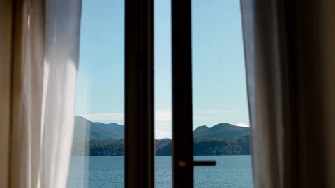 View of Lago Maggiore through opening window Stock Footage 150861182