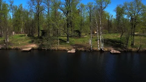 View of the lake from above. Early spring. Fishing lake with fishing platforms Stock Footage 274413691