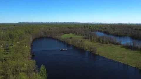 View of the lake from above. Early spring. Fishing lake with fishing platforms Stock Footage 274413714