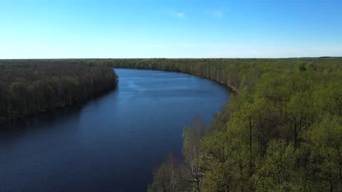 View of the lake from above. Early spring. Fishing lake with fishing platforms Stock Footage 274413764