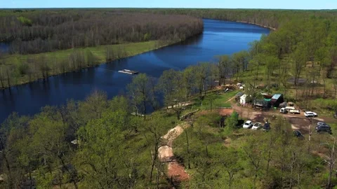 View of the lake from above. Early spring. Fishing lake with fishing platforms Stock Footage 274413859
