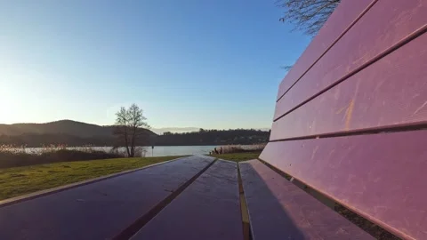 View of the lake from a bench Stock Footage 267623547