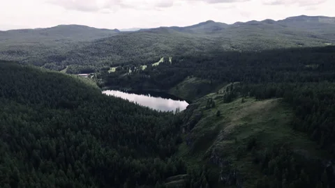 View on the lake between rocky mountains. Beautiful landscape Stock Footage 166068702