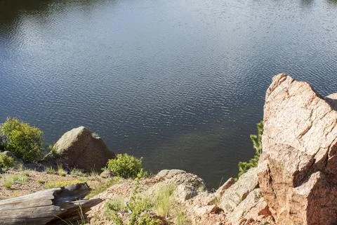 View of lake from cliff Foto stock