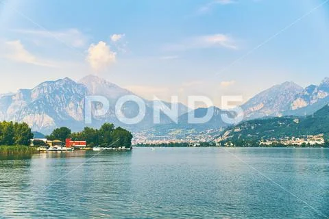 View of lake Como with parked boats and yachts near village of Pare, Lombardy Stock Photos