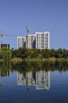 View from the lake to the construction site Stock Photos