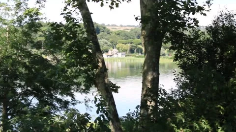 View of a lake covered with trees mountain lake bracciano rome italy Stock Footage 133820481