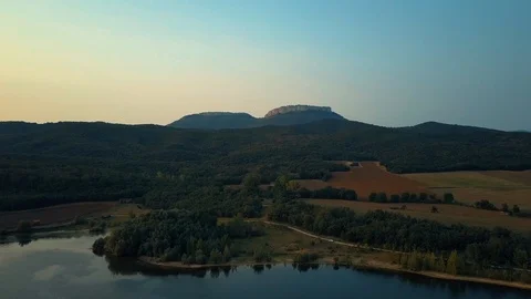 View of lake with field Stock Footage 94560721
