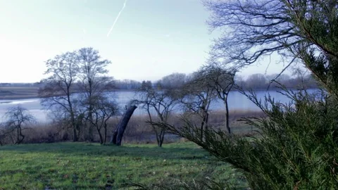 View on a lake, fields and orchard 스톡 동영상 71158429