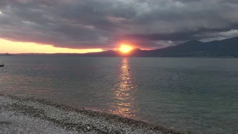 View of Lake Garda from the eastern shore with sunset Stock Footage 131835347