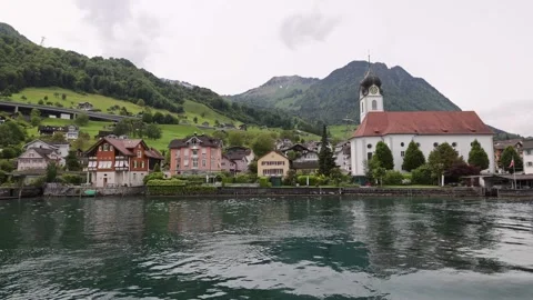 View of Lake Lucerne and historic church in Switzerland. Video stock 343670675